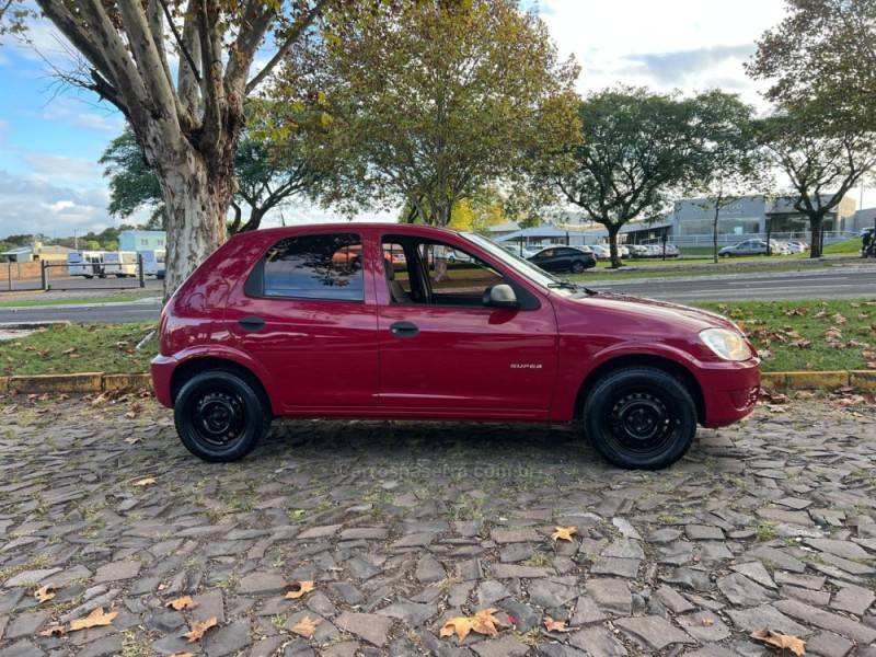 CHEVROLET - CELTA - 2008/2009 - Vermelha - R$ 25.900,00