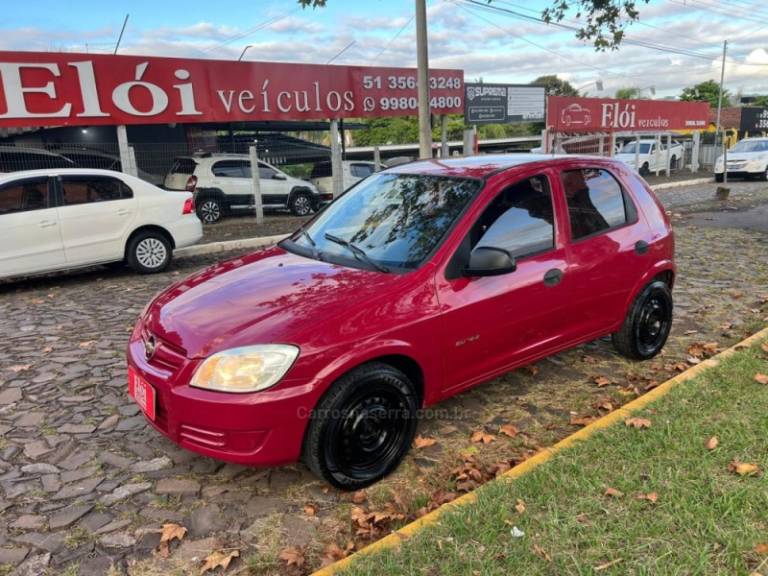 CHEVROLET - CELTA - 2008/2009 - Vermelha - R$ 25.900,00