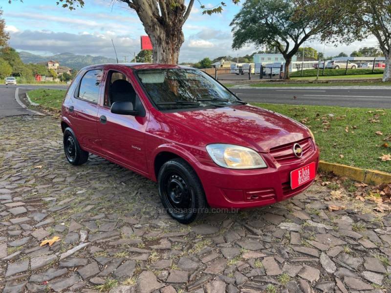 CHEVROLET - CELTA - 2008/2009 - Vermelha - R$ 25.900,00